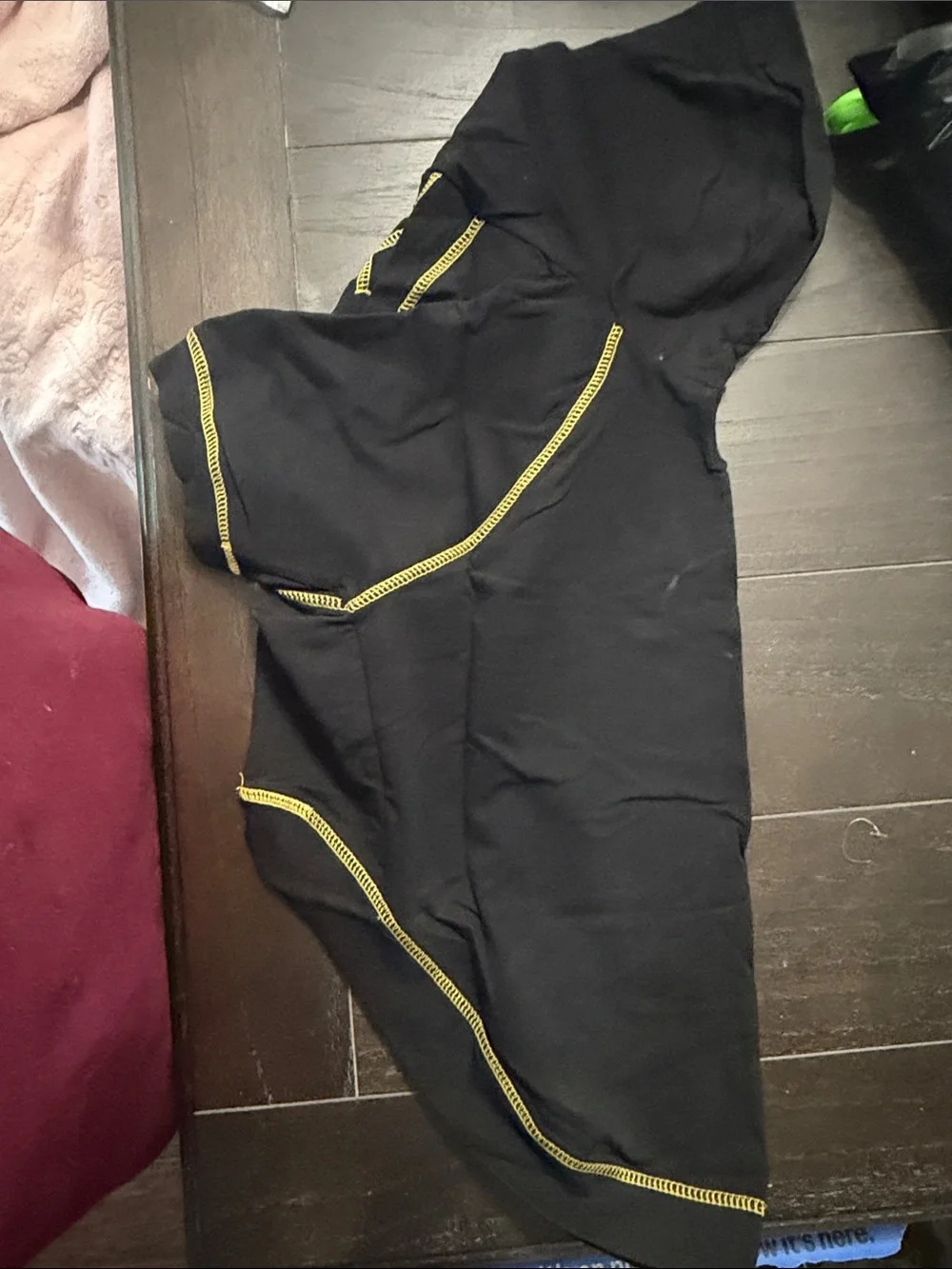 2 dog hooded t-shirts. On gray one black. Never used. Can fit 30 to 40 lbs dog